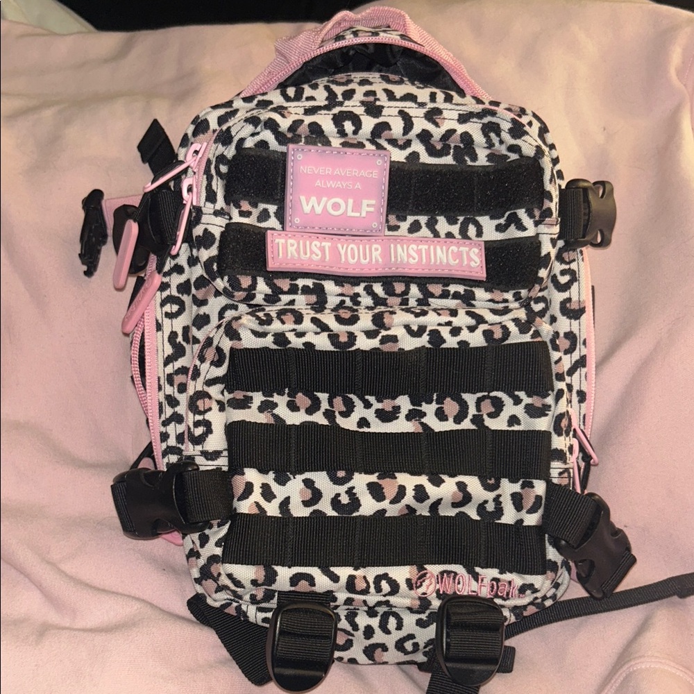 WOLFpak 9L Mini Backpack 
Pink and Black Leopard Backpack